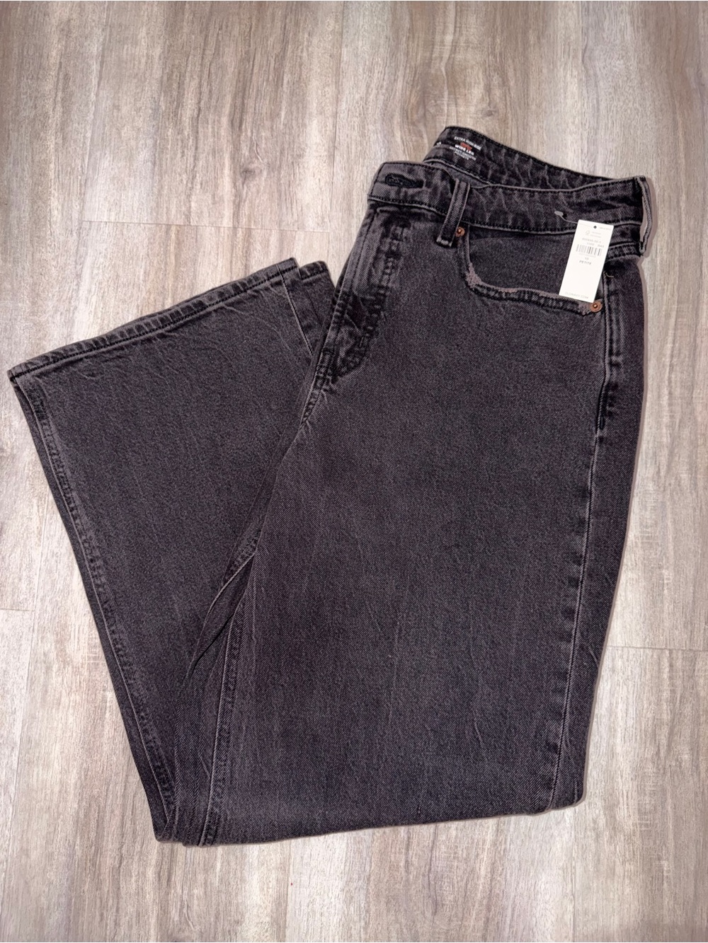 Old Navy women’s Extra High-Rise Wide-Leg Jeans in a dark gray/black wash.